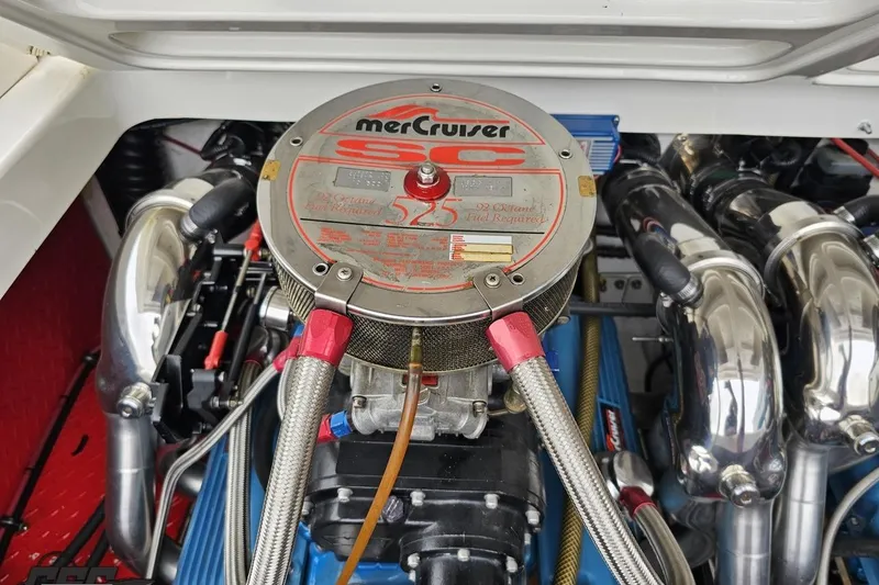 Slide: The Image of Engine of 2001 Wellcraft 33 Scarab AVS with MerCruiser components, showcasing performance features. - 97