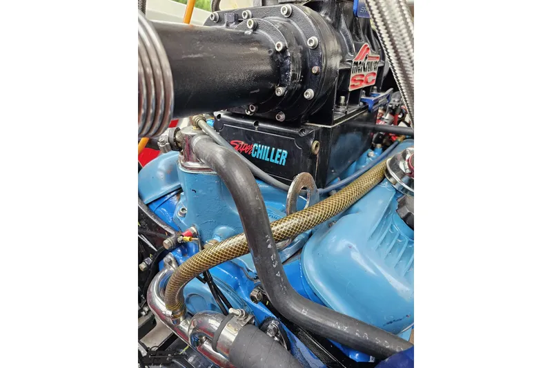 Slide: The Image of Close-up of 2001 Wellcraft 33 Scarab AVS engine with SuperChiller and Maximum SC components. - 99