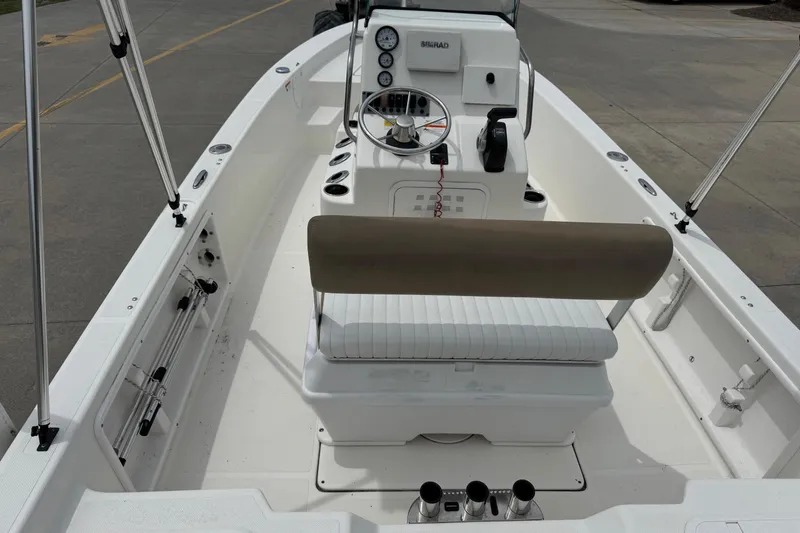Slide: The Image of 2016 Sea Born SV19 Bay boat interior with steering console and seating. - 11