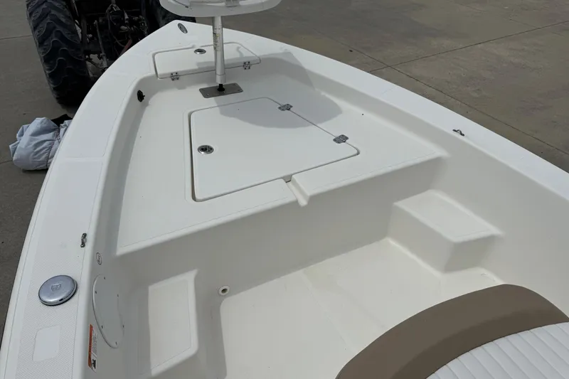 Slide: The Image of 2016 Sea Born SV19 Bay boat interior with storage compartments and seating. - 12