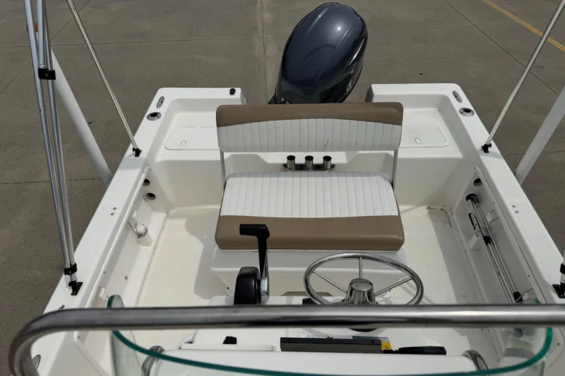 Slide: The Image of 2016 Sea Born SV19 Bay boat interior with steering wheel and seating. - 14