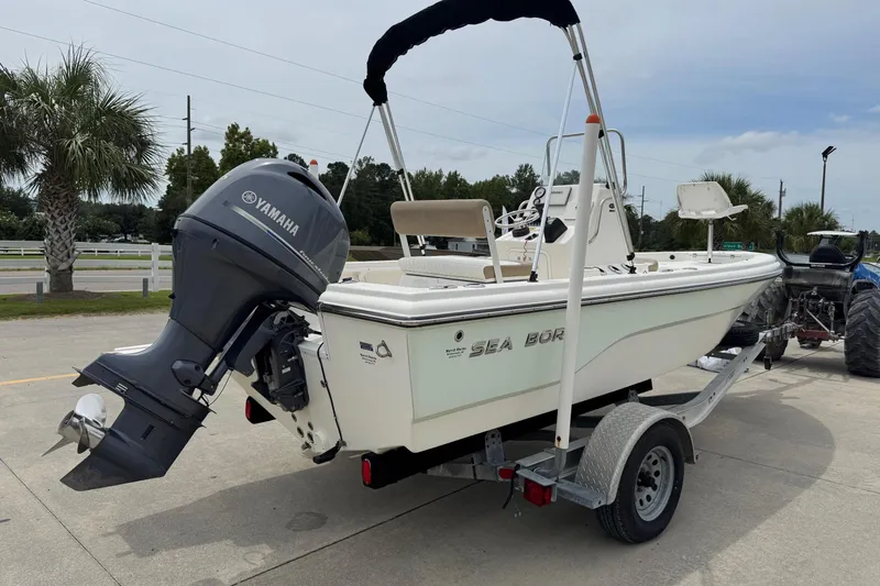 Slide: The Image of 2016 Sea Born SV19 Bay boat on trailer with Yamaha outboard motor. - 4