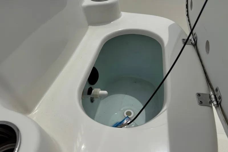 Slide: The Image of 2016 Sea Born SV19 Bay boat livewell interior with plumbing and fittings. - 8