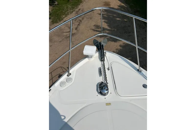 Slide: The Image of Bow of 2005 Sea Ray 390 Sundancer with anchor chain and railing. - 6
