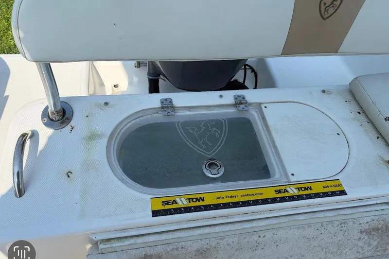 Slide: The Image of 2017 Century 2200 Center Console boat with Sea Tow ruler and storage compartment. - 13