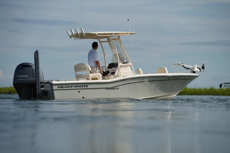 Slide: The Image of 2018 Grady-White 191 Coastal Explorer boat on calm water with Yamaha engine. - 14
