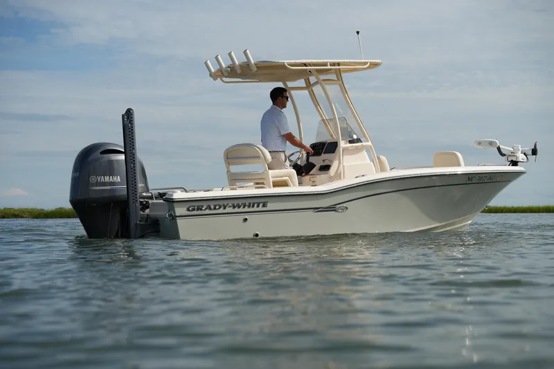 Slide: The Image of 2018 Grady-White 191 Coastal Explorer boat on water with Yamaha engine. - 17