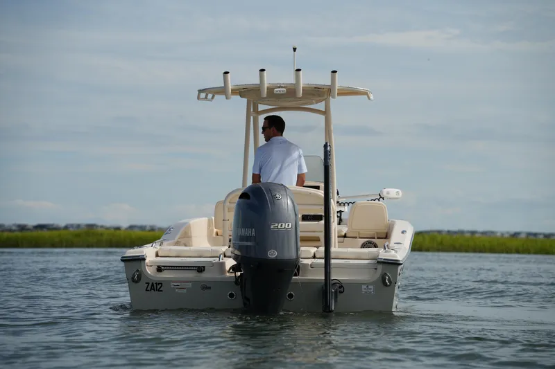 Slide: The Image of 2018 Grady-White 191 Coastal Explorer boat on water, rear view with Yamaha engine. - 20