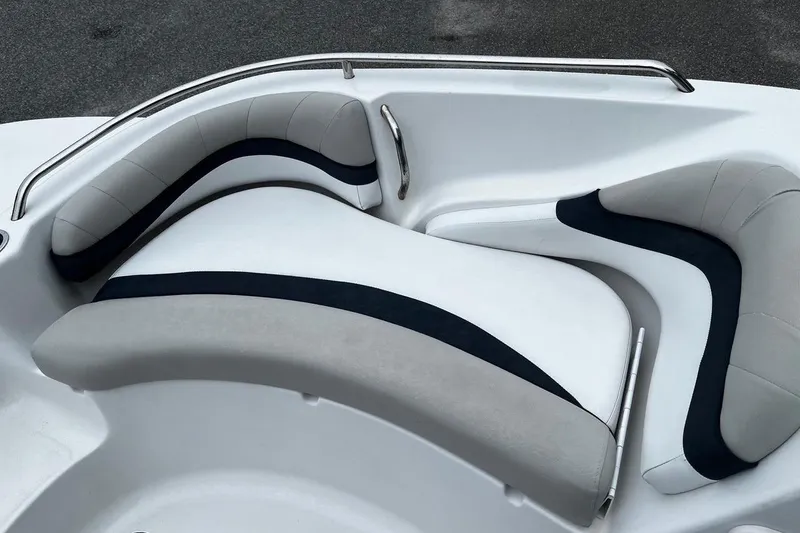 Slide: The Image of 2017 Starcraft Limited 2000 OB boat interior with cushioned seating and stainless steel railing. - 11