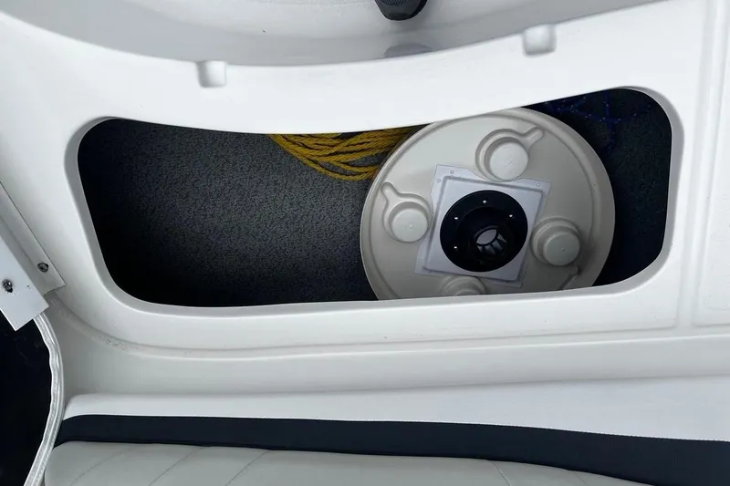 Slide: The Image of Storage compartment in a 2017 Starcraft Limited 2000 OB boat with rope and equipment. - 13