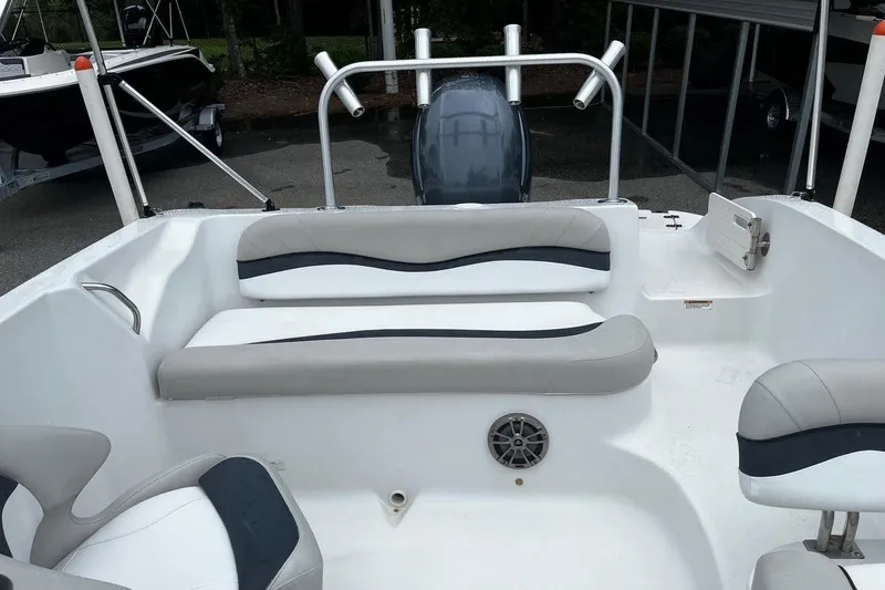 Slide: The Image of 2017 Starcraft Limited 2000 OB boat interior with seating and motor, showcasing modern design. - 8