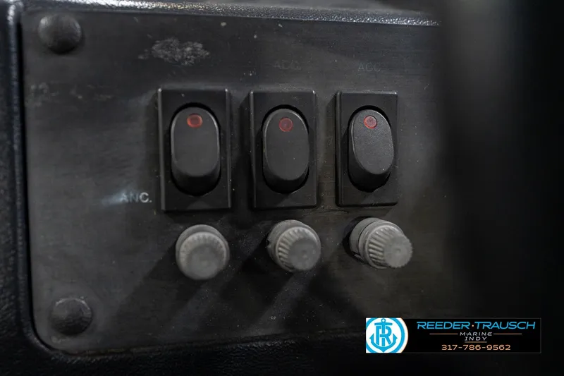 Slide: The Image of Close-up of 1992 Sun Tracker Party Barge 24 steering wheel with Tracker Marine logo. - 28