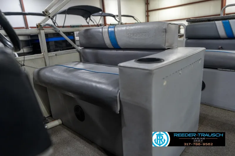 Slide: The Image of Control panel of a 1992 Sun Tracker Party Barge 24 with switches and buttons. - 31