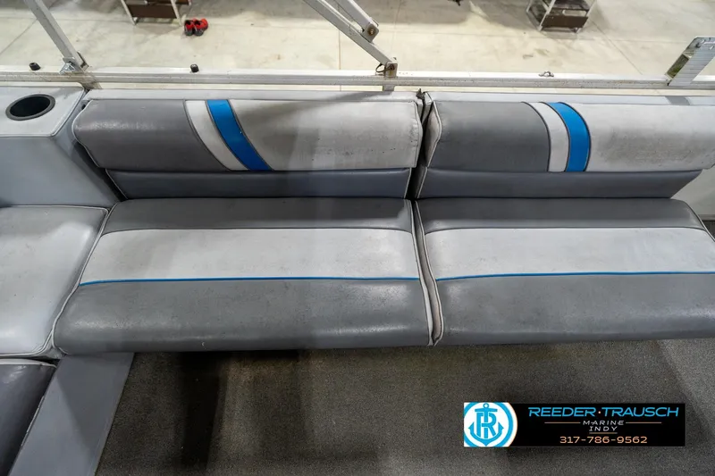 Slide: The Image of Gray and blue seating on a 1992 Sun Tracker Party Barge 24 pontoon boat. - 33