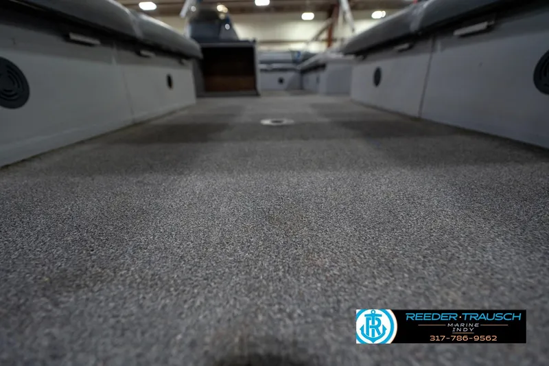 Slide: The Image of Cup holder on 1992 Sun Tracker Party Barge 24 boat, Reeder-Trausch Marine logo visible. - 37