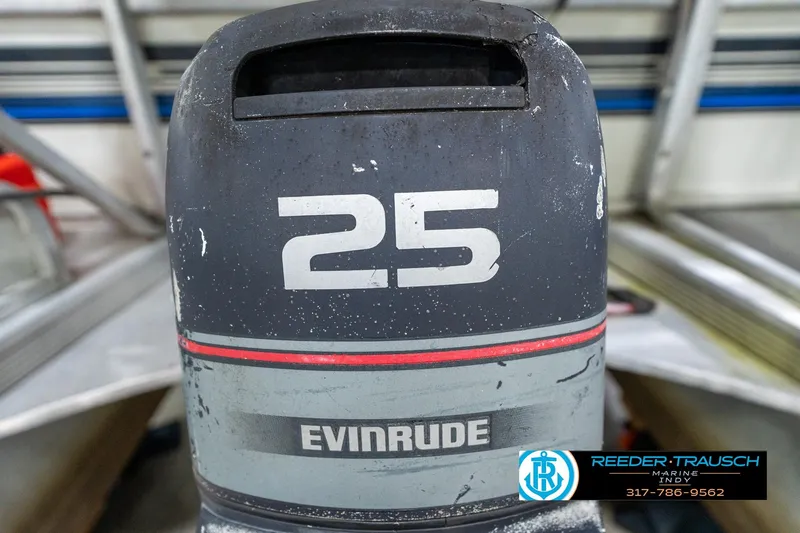 Slide: The Image of 1992 Sun Tracker Party Barge 24 boat with blue logo and Reeder-Trausch Marine contact details. - 43