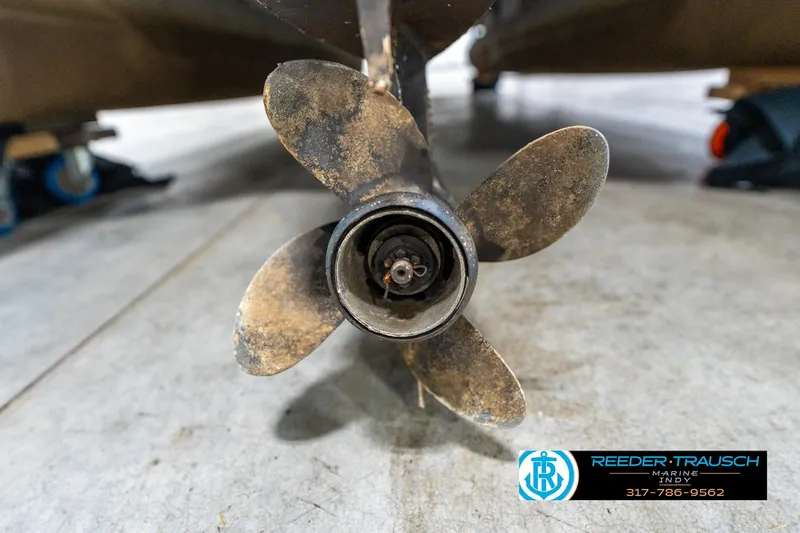 Slide: The Image of 1992 Sun Tracker Party Barge 24 logo on boat railing, Reeder-Trausch Marine contact. - 44