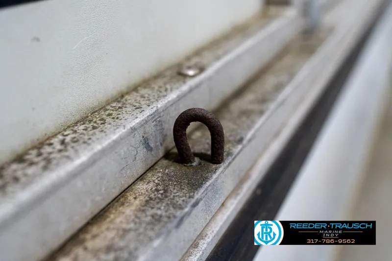 Slide: The Image of 1992 Sun Tracker Party Barge 24 logo with Reeder-Trausch Marine contact details. - 45