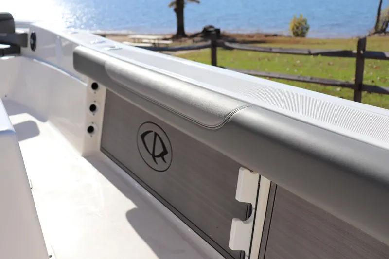 Slide: The Image of 2024 Sea Born LX24 Center Console boat interior with lake view. - 10