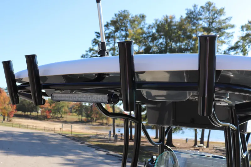 Slide: The Image of 2024 Sea Born LX24 Center Console boat with rod holders and LED light bar. - 9