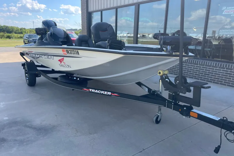 Slide: The Image of 2021 Bass Tracker PT175 boat on trailer outside dealership. - 4