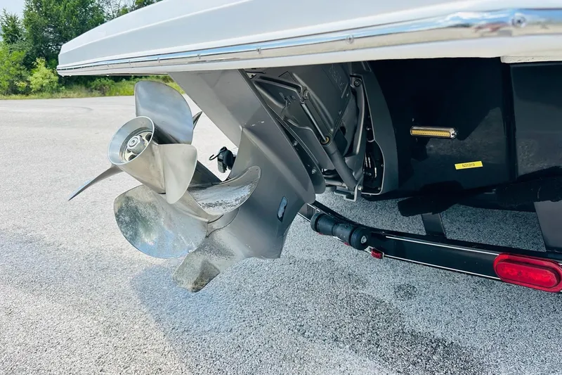 Slide: The Image of 2018 Regal 2300 Bowrider boat propeller and stern on a trailer. - 12