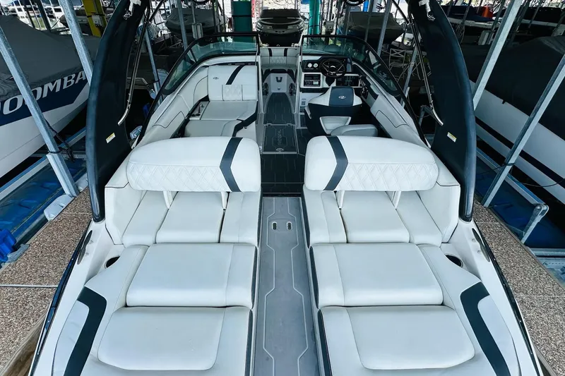 Slide: The Image of 2018 Regal 2300 Bowrider interior with luxurious white seating and sleek design. - 14