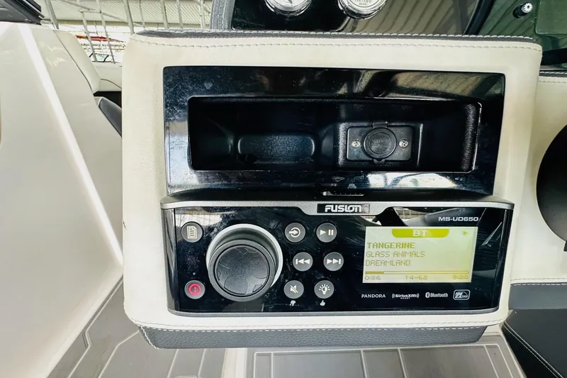 Slide: The Image of Fusion MS-UD650 stereo system in 2018 Regal 2300 Bowrider boat dashboard. - 21