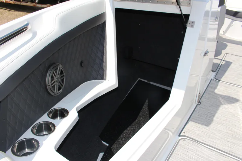 Slide: The Image of Interior of 2025 Cobalt R4 boat with speaker and cup holders. - 10