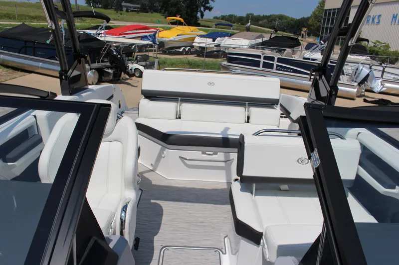 Slide: The Image of Interior of 2025 Cobalt R4 boat with white seating and modern design. - 14