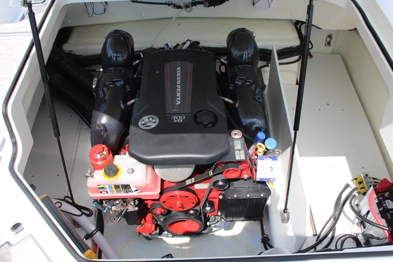 Slide: The Image of Engine compartment of 2025 Cobalt R4 boat featuring Volvo Penta 300 V8 engine. - 23