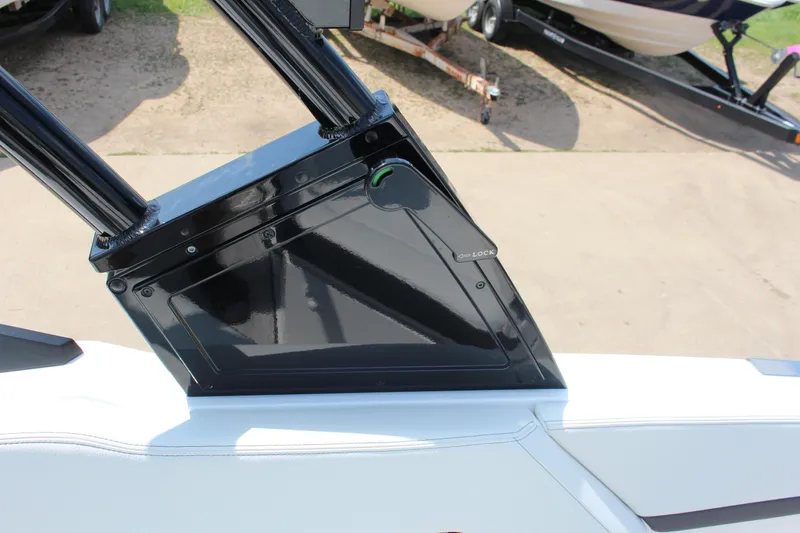 Slide: The Image of 2025 Cobalt R4 boat detail showing sleek black locking mechanism. - 25