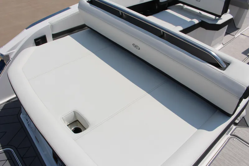 Slide: The Image of 2025 Cobalt R4 boat with sleek white seating and modern design. - 6