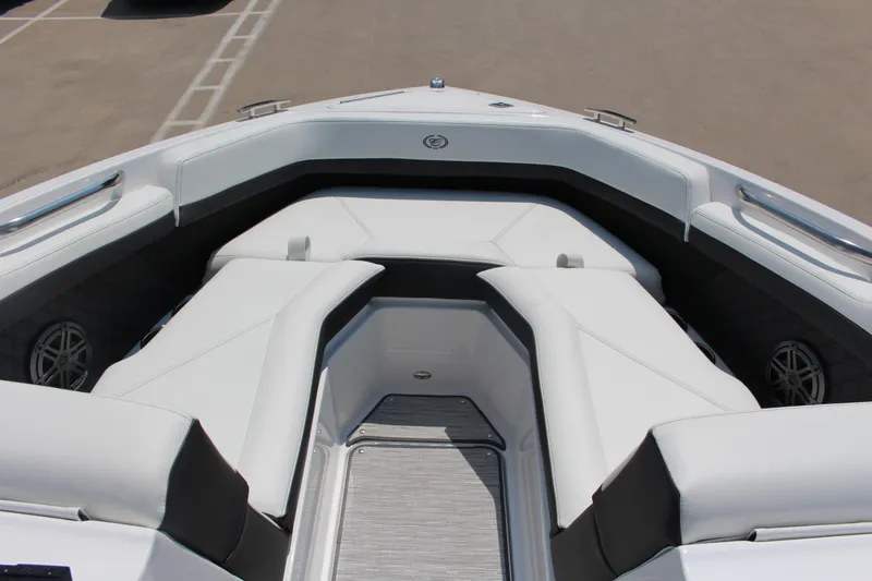 Slide: The Image of 2025 Cobalt R4 boat interior with sleek white seating and modern design. - 8