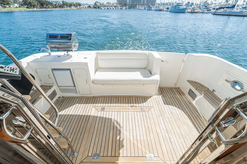Slide: The Image of Luxurious 2002 McKinna 57 Pilothouse yacht deck with seating and ocean view. - 26