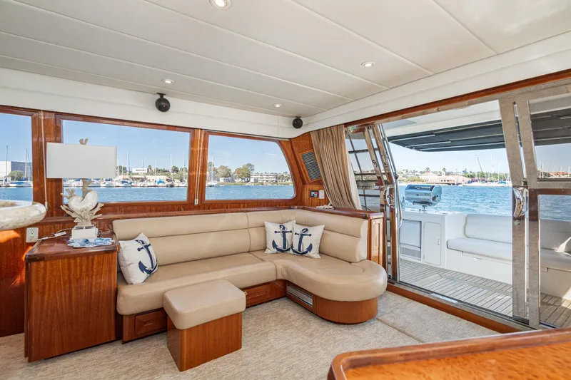 Slide: The Image of Luxurious interior of 2002 McKinna 57 Pilothouse yacht with waterfront view. - 35