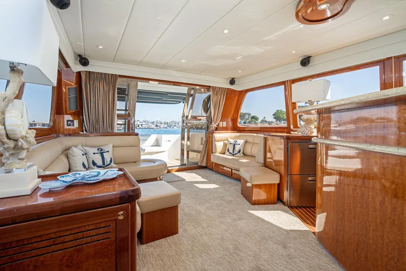 Slide: The Image of Luxurious interior of 2002 McKinna 57 Pilothouse yacht with elegant seating and nautical decor. - 37