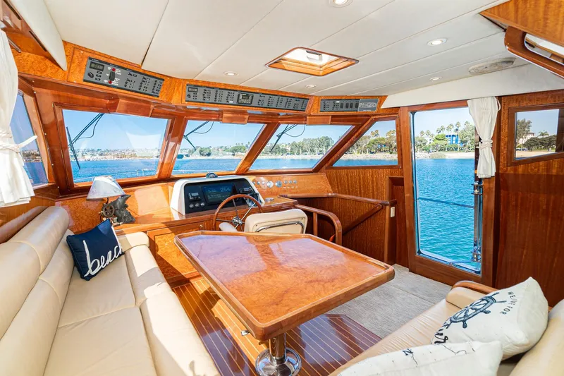 Slide: The Image of Luxurious 2002 McKinna 57 Pilothouse interior with wood finish and scenic water view. - 43