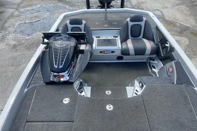 Slide: The Image of 2014 Ranger 520C boat interior with seating and storage compartments. - 5