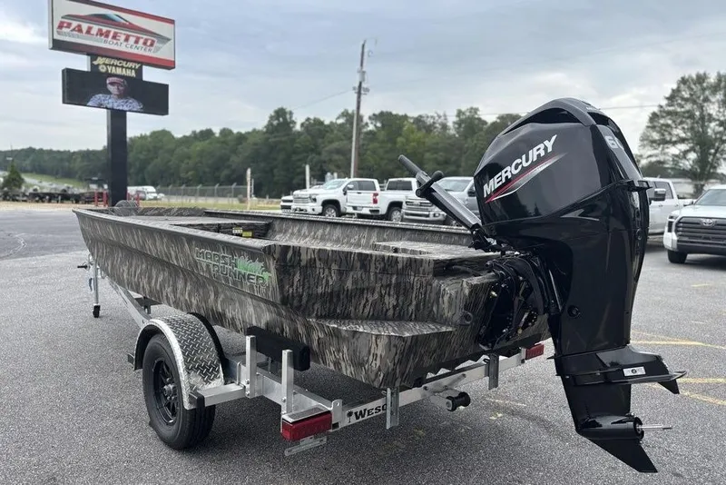 Slide: The Image of 2025 Havoc 1756 MRST boat with Mercury engine on trailer at dealership. - 3