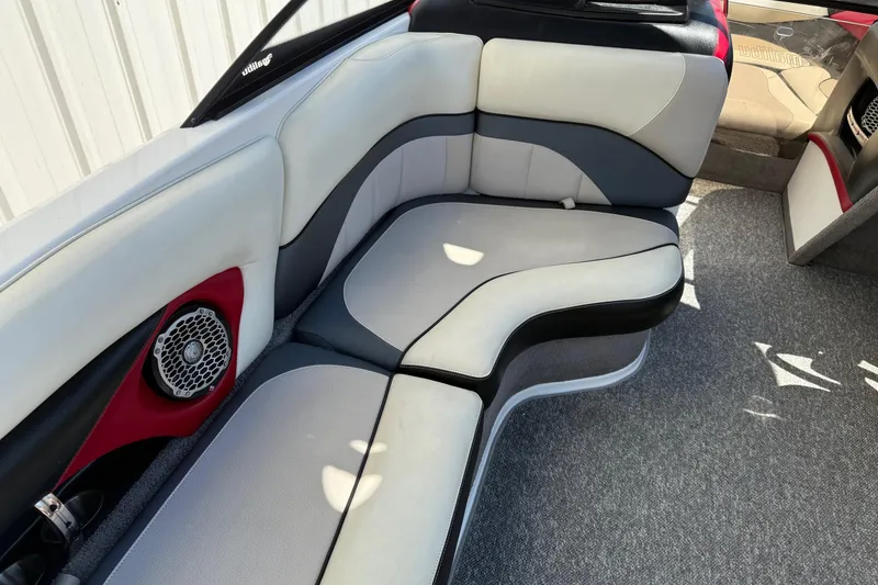 Slide: The Image of 2011 Malibu Wakesetter 23 LSV interior with stylish seating and speaker system. - 10