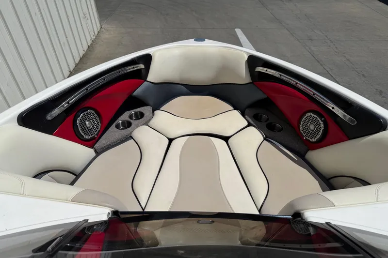 Slide: The Image of Interior of 2011 Malibu Wakesetter 23 LSV boat with stylish seating and speakers. - 7