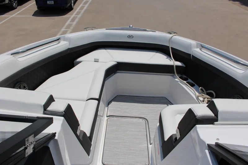 Slide: The Image of 2025 Cobalt R8 boat interior with sleek seating and modern design. - 12