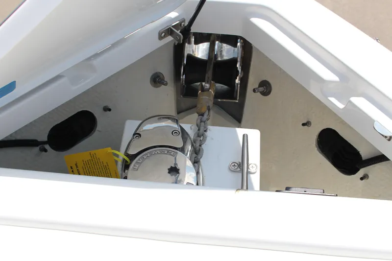 Slide: The Image of Anchor compartment of 2025 Cobalt R8 boat with chain and winch system. - 14