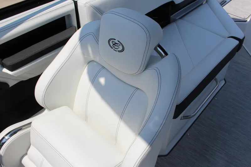 Slide: The Image of Luxurious white seating in 2025 Cobalt R8 boat, featuring elegant stitching and modern design. - 21