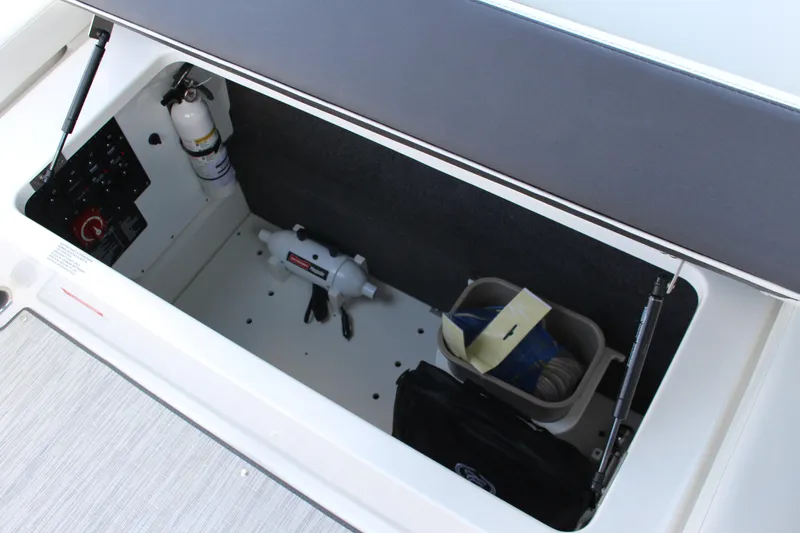 Slide: The Image of 2025 Cobalt R8 storage compartment with safety equipment and accessories. - 23