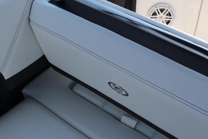 Slide: The Image of 2025 Cobalt R8 interior with white leather seating and speaker detail. - 29