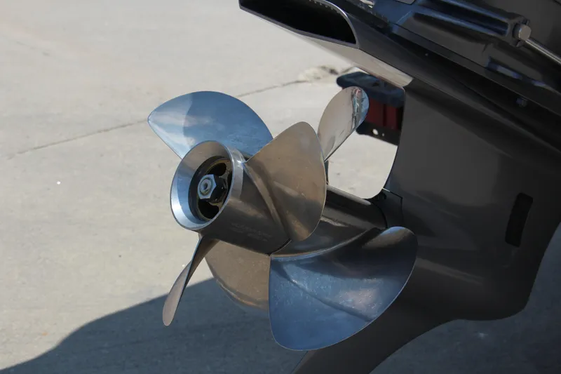 Slide: The Image of Close-up of a 2025 Cobalt R8 boat propeller on a concrete surface. - 39