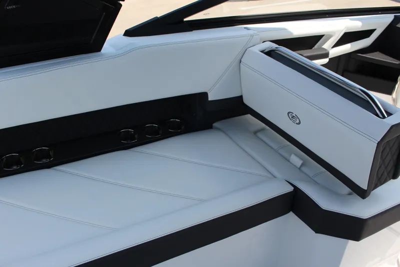 Slide: The Image of 2025 Cobalt R8 interior with sleek white seating and integrated cup holders. - 8