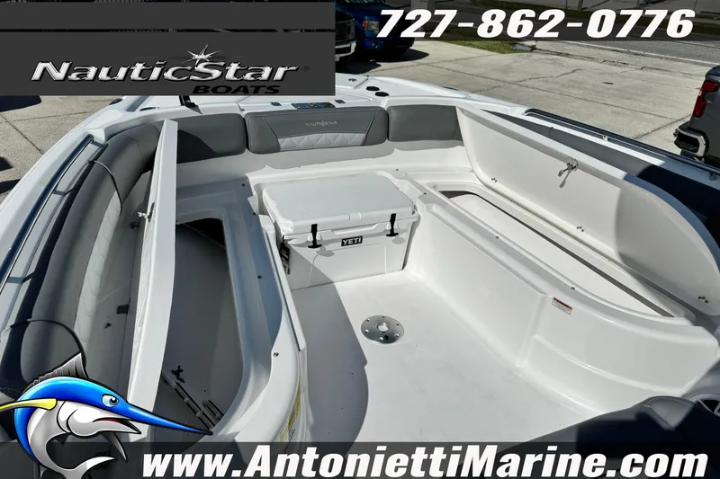Slide: The Image of 2026 NauticStar 251 Hybrid boat interior with seating and storage, displayed by Antonietti Marine. - 11